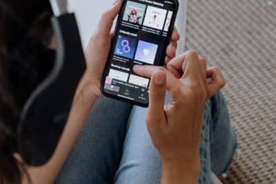 person listening to music on a smartphone